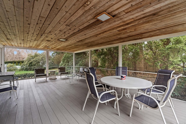9 Academy Ln, Old Lyme, CT 06371 - wooden terrace featuring outdoor dining area and view of wooded area