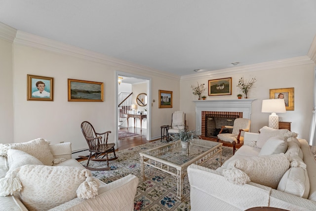 9 Academy Ln, Old Lyme, CT 06371 - living room featuring crown molding, stairs, a brick fireplace, wood finished floors, and a baseboard radiator