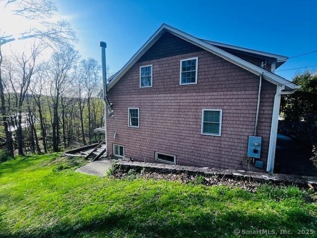 37 Fulton Dr, New Fairfield, CT 06812 - view of side of home featuring a yard