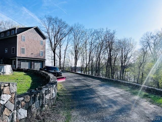 37 Fulton Dr, New Fairfield, CT 06812 - view of dirt / gravel driveway