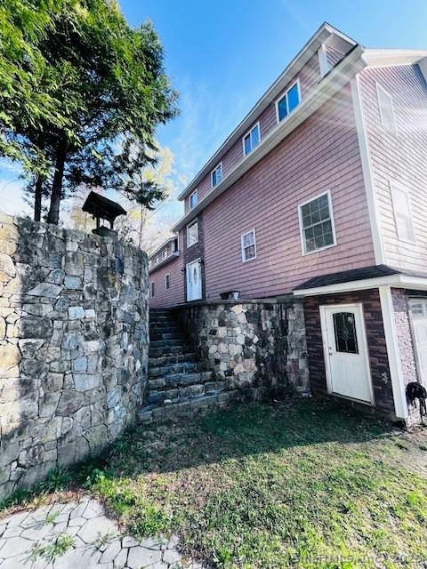 37 Fulton Dr, New Fairfield, CT 06812 - view of property exterior featuring stone siding