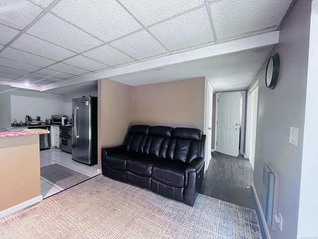 37 Fulton Dr, New Fairfield, CT 06812 - living room with baseboards and a paneled ceiling