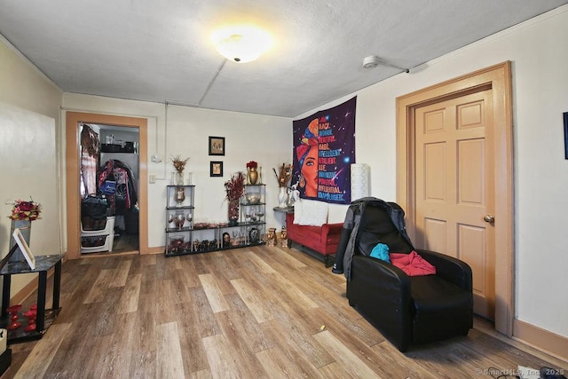 living area with wood finished floors