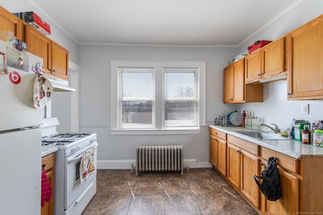 1909 Broad St, Hartford, CT 06114 - kitchen featuring radiator, light countertops, a sink, white appliances, and baseboards