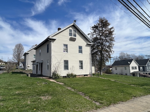 209 W Center St, Southington, CT 06489 - view of home's exterior featuring a yard and a chimney