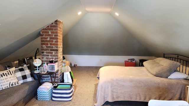 carpeted bedroom with vaulted ceiling