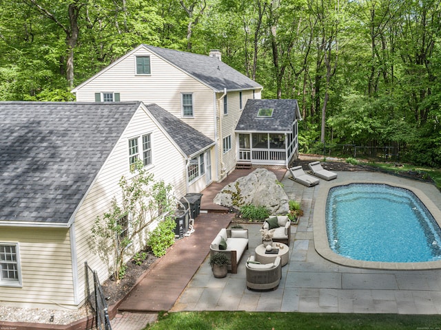 20 Linden Rd, Ridgefield, CT 06877 - back of house featuring a sunroom, a patio area, roof with shingles, and fence