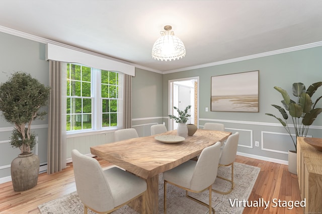 20 Linden Rd, Ridgefield, CT 06877 - dining area featuring light wood-style floors, ornamental molding, a wainscoted wall, and a baseboard heating unit