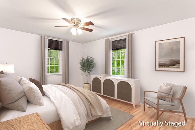20 Linden Rd, Ridgefield, CT 06877 - bedroom featuring multiple windows, light wood finished floors, and a ceiling fan