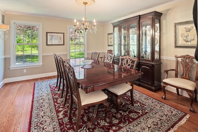 7 Tunxis Trl, Redding, CT 06896 - dining room featuring an inviting chandelier, baseboards, crown molding, and wood finished floors