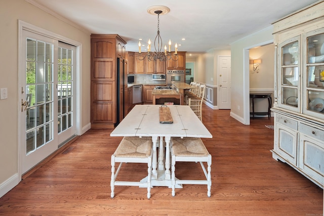 7 Tunxis Trl, Redding, CT 06896 - dining room featuring ornamental molding, wood finished floors, baseboards, recessed lighting, and a notable chandelier