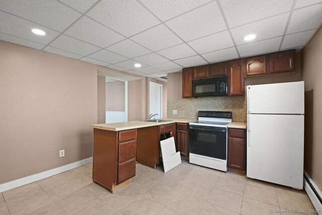 10 Silver St, Middletown, CT 06457 - kitchen featuring range with electric cooktop, black microwave, freestanding refrigerator, a sink, and a baseboard heating unit