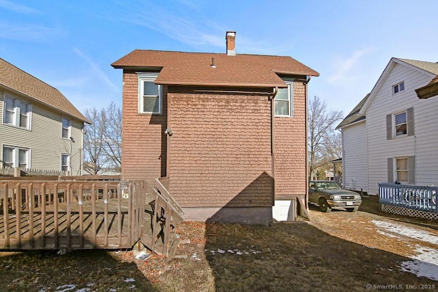 10 Silver St, Middletown, CT 06457 - rear view of house with a wooden deck, a chimney, and a shingled roof