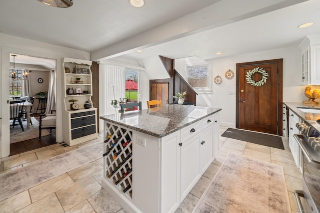 329 Weekeepeemee Rd, Woodbury, CT 06798 - kitchen with stone countertops, plenty of natural light, and stainless steel stove