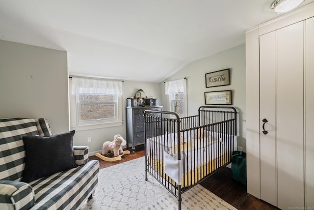 329 Weekeepeemee Rd, Woodbury, CT 06798 - bedroom with dark wood-type flooring, baseboards, a nursery area, and vaulted ceiling