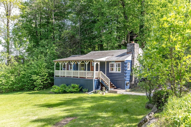11 Summer Hill Rd, New Fairfield, CT 06812 - view of front of house featuring a porch, a front lawn, and a chimney