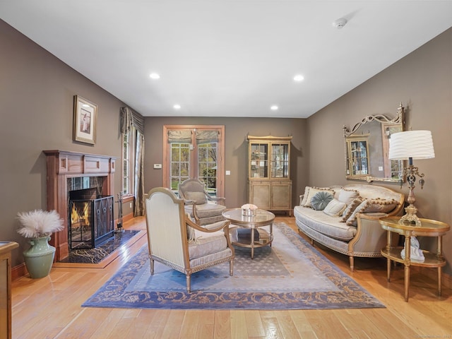 17 Fire Hill Ln, Redding, CT 06896 - living room featuring wood-type flooring, recessed lighting, a fireplace, and baseboards