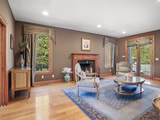 17 Fire Hill Ln, Redding, CT 06896 - living room featuring wood finished floors, a fireplace, baseboards, and recessed lighting