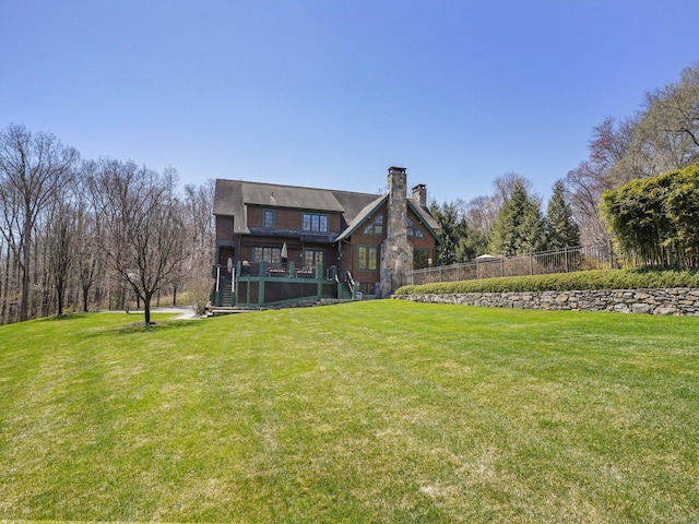 17 Fire Hill Ln, Redding, CT 06896 - rear view of property featuring a chimney and a wooden deck
