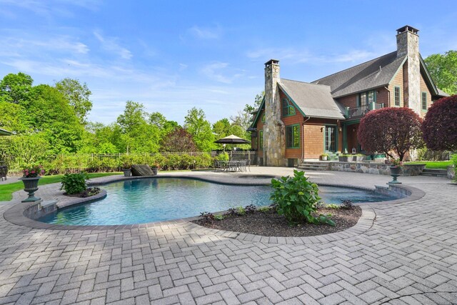 17 Fire Hill Ln, Redding, CT 06896 - view of swimming pool with a patio area and fence