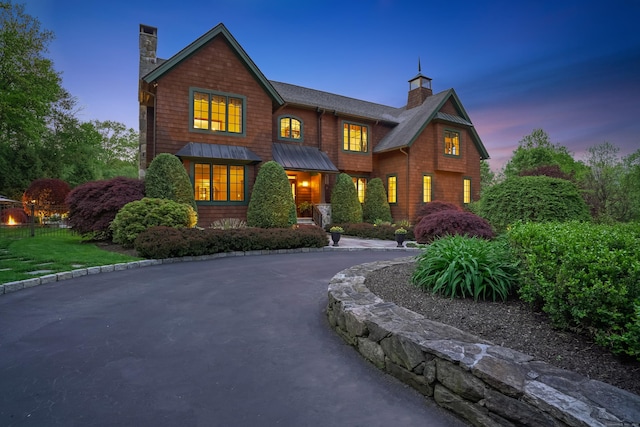 17 Fire Hill Ln, Redding, CT 06896 - shingle-style home with a chimney, curved driveway, a standing seam roof, and fence