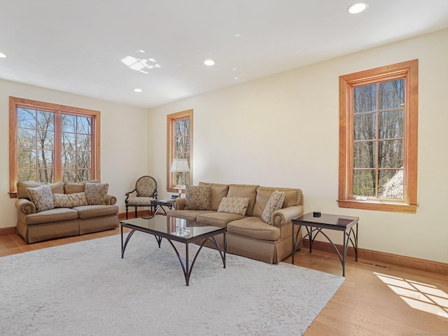 17 Fire Hill Ln, Redding, CT 06896 - living room with recessed lighting, plenty of natural light, baseboards, and light wood-style floors