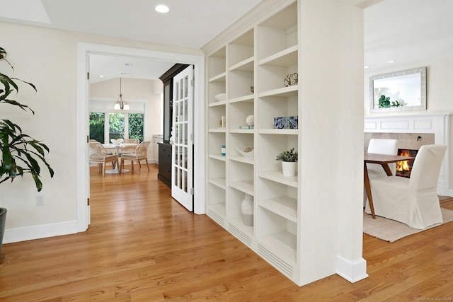 13 Bryan Rd, Norwalk, CT 06853 - hall with light wood-type flooring, baseboards, recessed lighting, and a chandelier