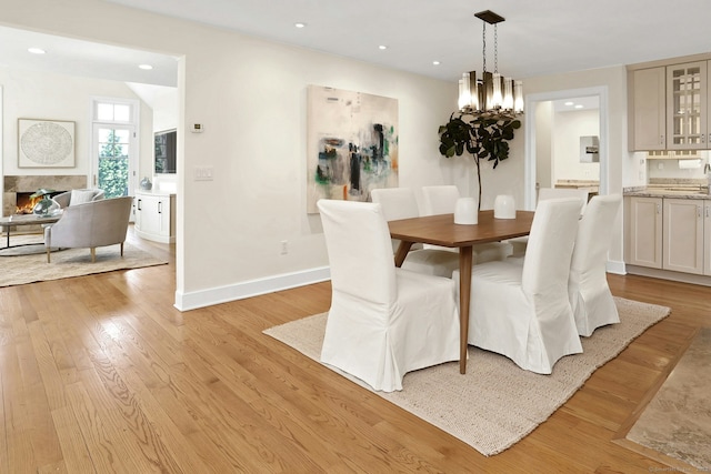 13 Bryan Rd, Norwalk, CT 06853 - dining area with light wood-type flooring, recessed lighting, baseboards, and a chandelier