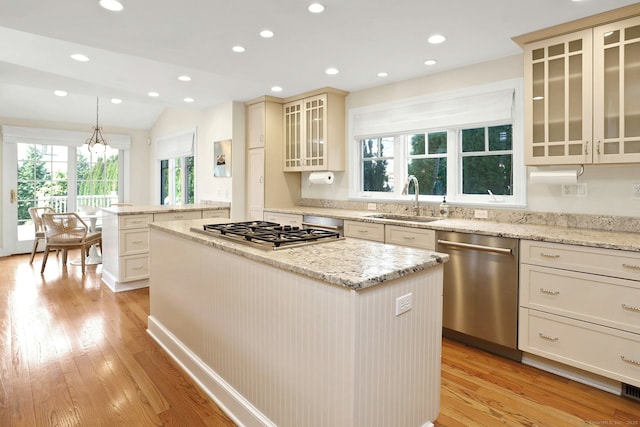 13 Bryan Rd, Norwalk, CT 06853 - kitchen with stainless steel appliances, a center island, a sink, light wood-style flooring, and recessed lighting