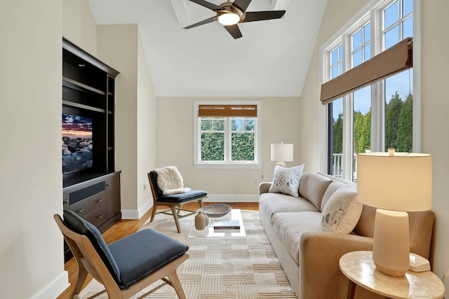 13 Bryan Rd, Norwalk, CT 06853 - living area featuring healthy amount of natural light, ceiling fan, high vaulted ceiling, baseboards, and wood finished floors