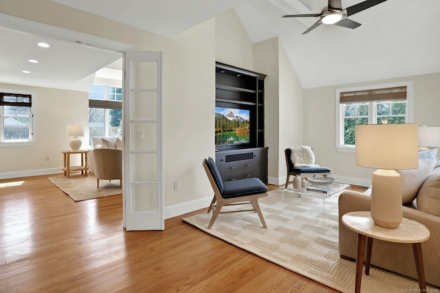 13 Bryan Rd, Norwalk, CT 06853 - living area featuring light wood-style floors, healthy amount of natural light, baseboards, recessed lighting, and lofted ceiling