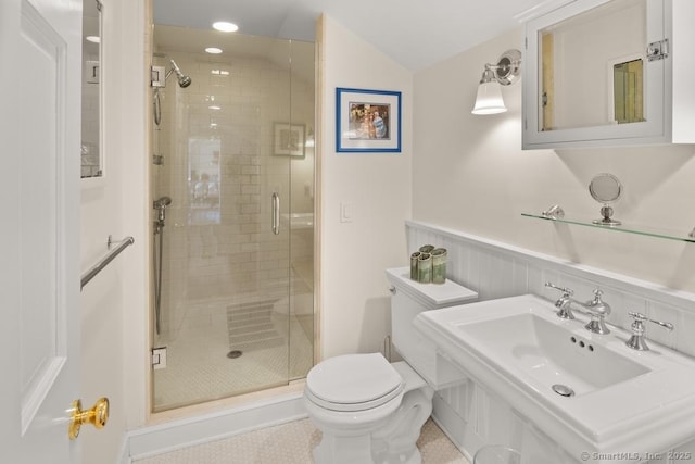 13 Bryan Rd, Norwalk, CT 06853 - bathroom with a shower stall, toilet, a wainscoted wall, a sink, and lofted ceiling