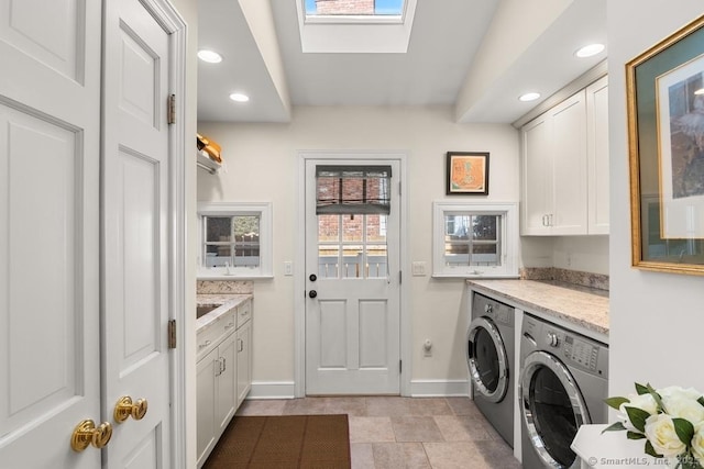 13 Bryan Rd, Norwalk, CT 06853 - clothes washing area featuring cabinet space, separate washer and dryer, recessed lighting, baseboards, and a skylight