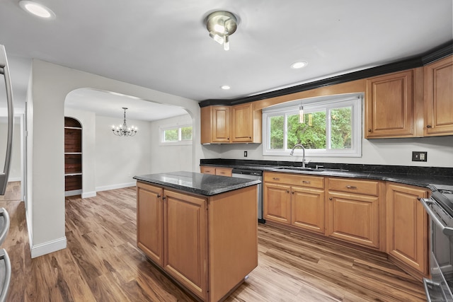 33 Jolley Rd, Plainfield, CT 06239 - kitchen with stainless steel appliances, arched walkways, a sink, a chandelier, and a center island
