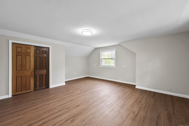 33 Jolley Rd, Plainfield, CT 06239 - additional living space featuring wood finished floors, baseboards, and vaulted ceiling