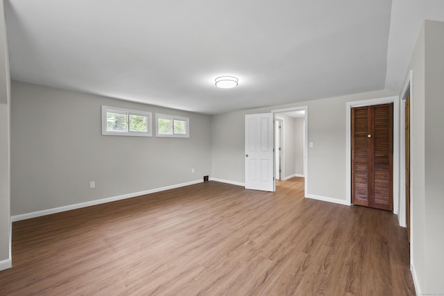 33 Jolley Rd, Plainfield, CT 06239 - unfurnished bedroom featuring wood finished floors, a closet, and baseboards