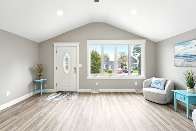 27 Prospect Ave, East Lyme, CT 06357 - entrance foyer featuring wood finished floors, lofted ceiling, baseboards, and recessed lighting