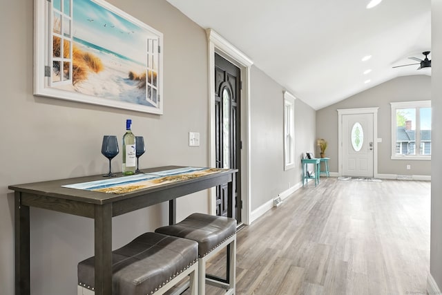 27 Prospect Ave, East Lyme, CT 06357 - entryway with wood finished floors, vaulted ceiling, ceiling fan, and baseboards