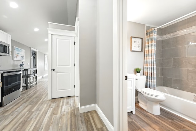 27 Prospect Ave, East Lyme, CT 06357 - full bathroom featuring wood finished floors, toilet, recessed lighting, shower / bathtub combination with curtain, and baseboards
