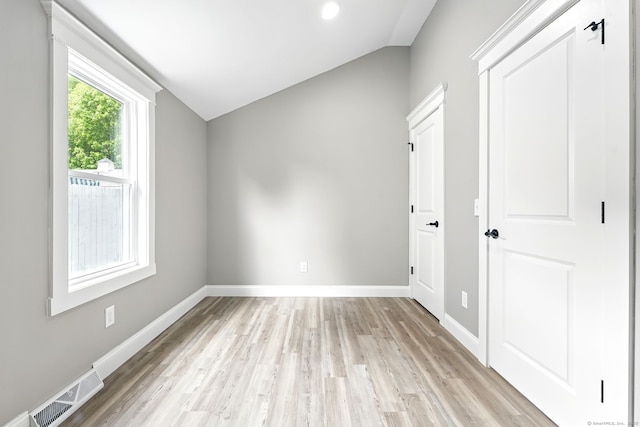 27 Prospect Ave, East Lyme, CT 06357 - spare room with vaulted ceiling, light wood-style flooring, and baseboards