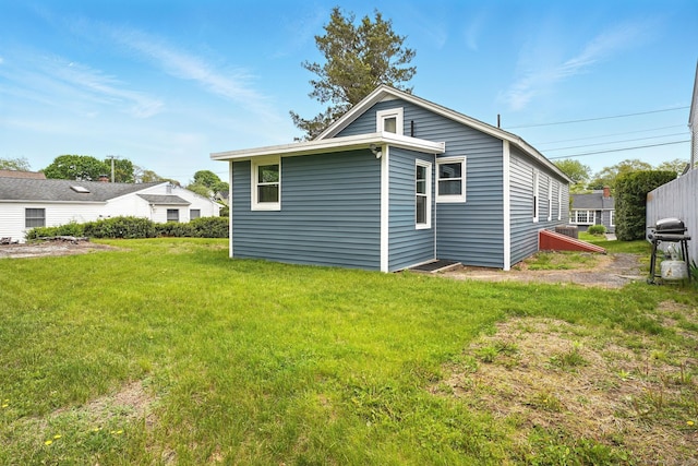 27 Prospect Ave, East Lyme, CT 06357 - back of house featuring a lawn