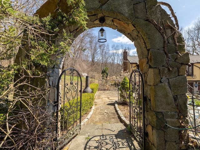 view of gate featuring fence