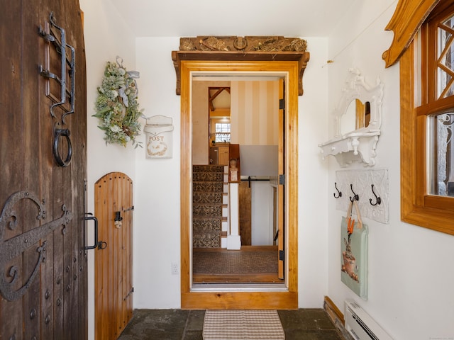mudroom featuring baseboard heating