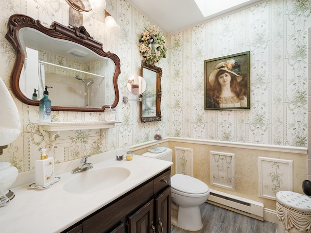 full bathroom featuring wallpapered walls, wood finished floors, toilet, a skylight, and baseboard heating