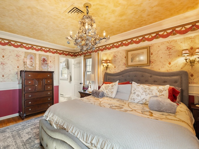 bedroom featuring wallpapered walls, an inviting chandelier, dark wood finished floors, ornamental molding, and visible vents