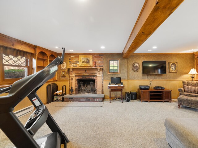 living area with recessed lighting, a wainscoted wall, a baseboard heating unit, carpet floors, and a fireplace