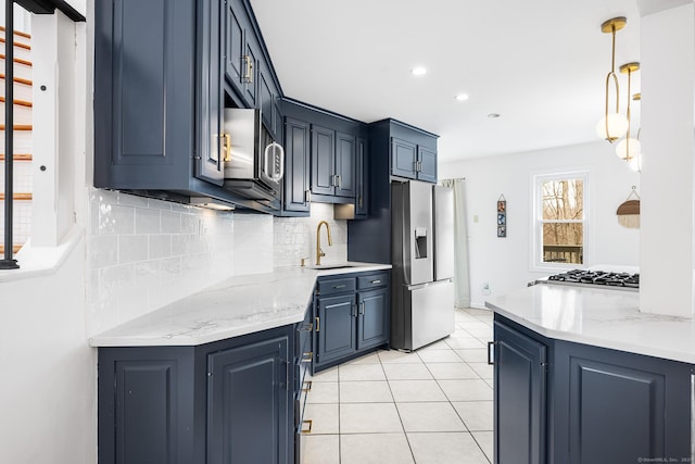kitchen featuring tasteful backsplash, light tile patterned floors, pendant lighting, stainless steel appliances, and recessed lighting