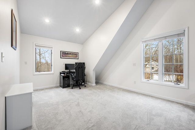 office featuring recessed lighting, baseboards, lofted ceiling, and carpet