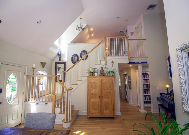 6 Rogers Dr, Stonington, CT 06355 - stairs featuring high vaulted ceiling, wood finished floors, and baseboards