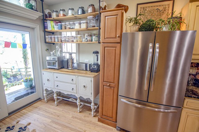 6 Rogers Dr, Stonington, CT 06355 - kitchen with freestanding refrigerator, open shelves, and light wood-style flooring